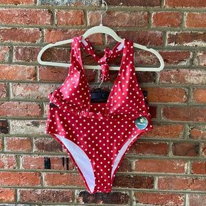 Large red polka dot bikini.